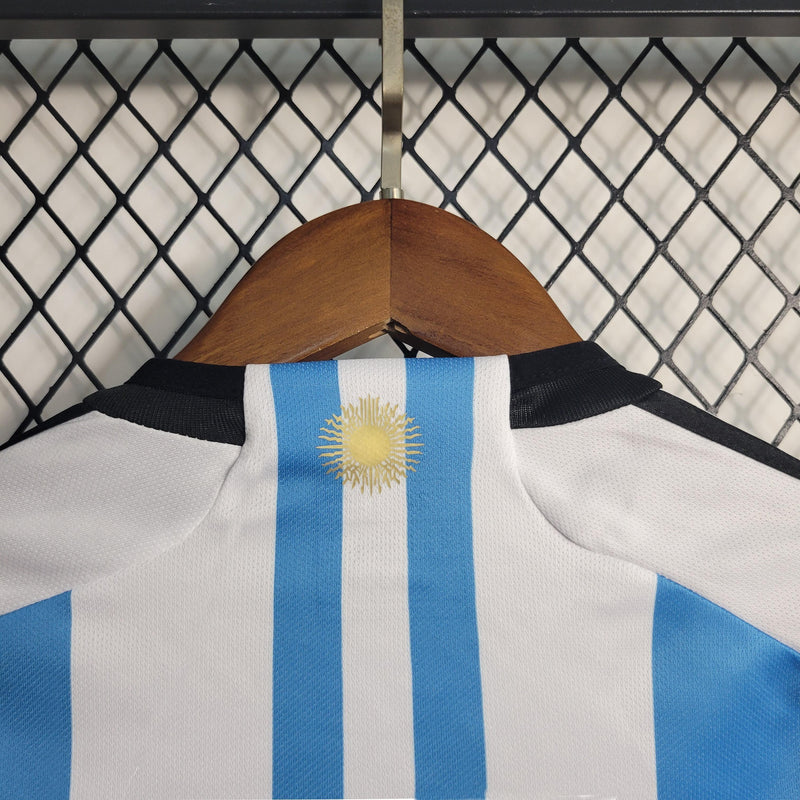 Camiseta Argentina 22/23 - Niños (Pantalón Corto Incluido) - Lux Shop